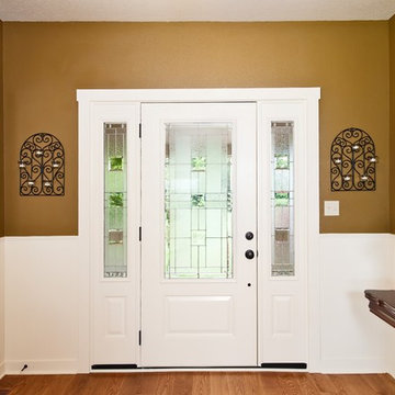 Elegant Entrance with White Wainscoting
