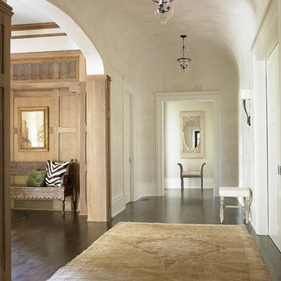 Inspiration for a large timeless dark wood floor foyer remodel in Atlanta with beige walls