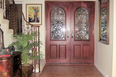 Entry Doors and wrought iron staircase