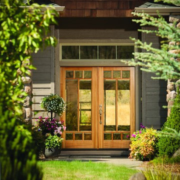 Entry Doors - French double with decorative wood and brown finish