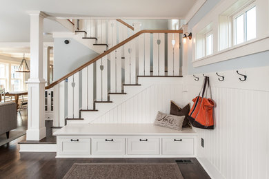 Entryway - traditional dark wood floor entryway idea in Seattle