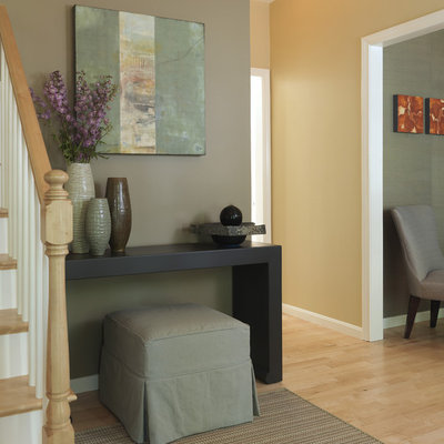 Inspiration for a timeless light wood floor foyer remodel in Boston