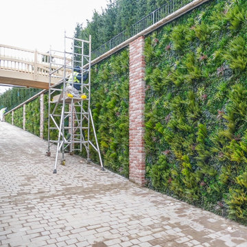 Entry Way to Car Lot Upgraded with Fake Green Walls