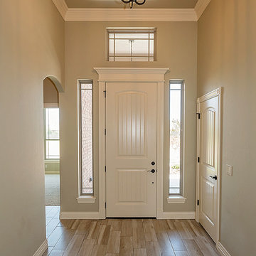 Entry Way with Tall Ceilings and Natural Light