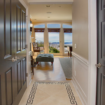 Entry way with tile and hardwood flooring. River views.