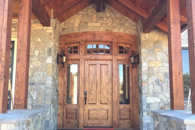 Single front door - traditional single front door idea in San Luis Obispo with a medium wood front door