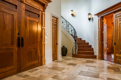 Tuscan entryway photo in Chicago