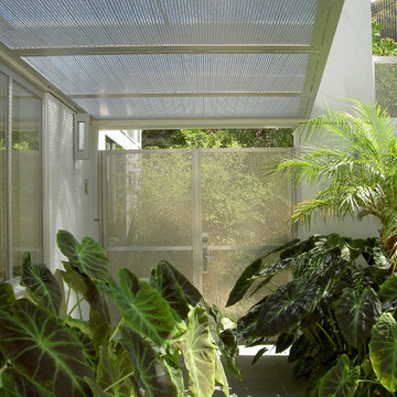 Exterior Gate to contemporary home by MGS architecture