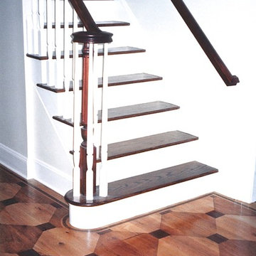 Faux wood inlay painted floor over wide plank pine.
