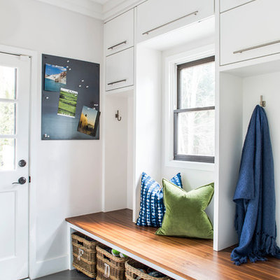 Inspiration for a transitional gray floor entryway remodel in Atlanta with gray walls and a glass front door