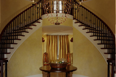 Inspiration for a timeless limestone floor foyer remodel in San Luis Obispo with yellow walls