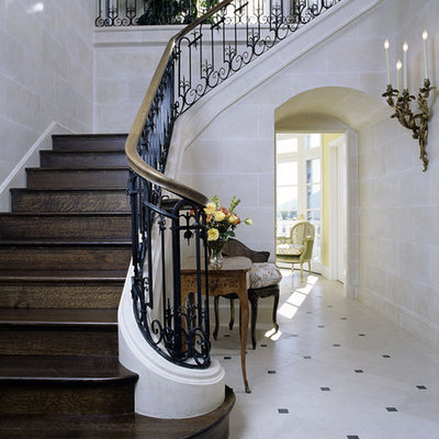 Example of a classic foyer design in Santa Barbara with beige walls