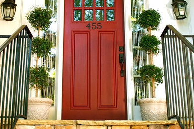 Inspiration for a timeless entryway remodel in Atlanta with a red front door