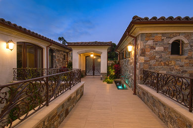 Inspiration for a mediterranean entryway remodel in Orange County