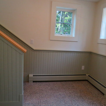 Garage apartment in green wainscotting