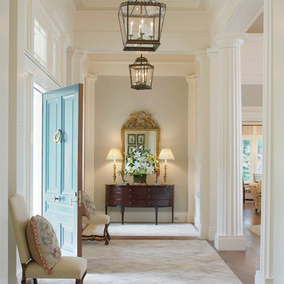 Elegant beige floor entryway photo in Atlanta with a blue front door