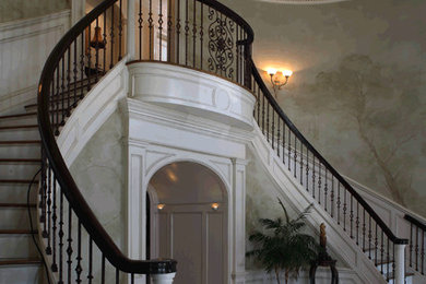 Example of a classic marble floor and beige floor entryway design in New York with multicolored walls and a dark wood front door