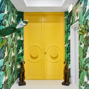 Design ideas for a contemporary foyer in Brisbane with green walls, a double front door, a yellow front door, white floor and wallpaper.