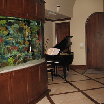 Grand Entry with a custom 60" salt water aquarium.