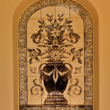 Hand painted tile mural with floral design