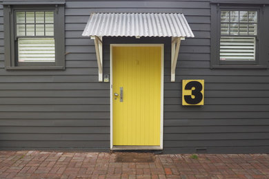 メルボルンにある低価格の小さなエクレクティックスタイルのおしゃれな玄関の写真