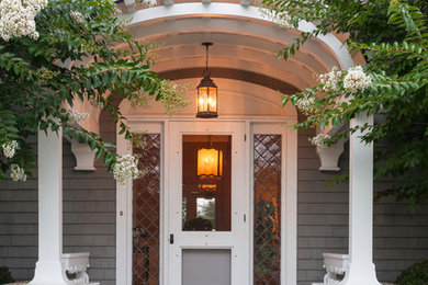 Inspiration for a timeless front door remodel in New York