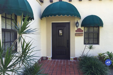 Inspiration for a craftsman entryway remodel in Miami