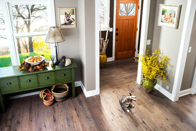 Example of a cottage entryway design in Other
