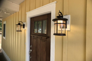 Example of an arts and crafts entryway design in Other