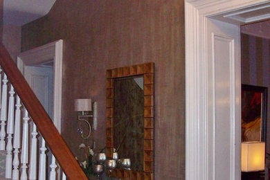 Mid-sized elegant carpeted entryway photo in Kansas City with metallic walls