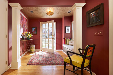 Example of an eclectic foyer design in Minneapolis
