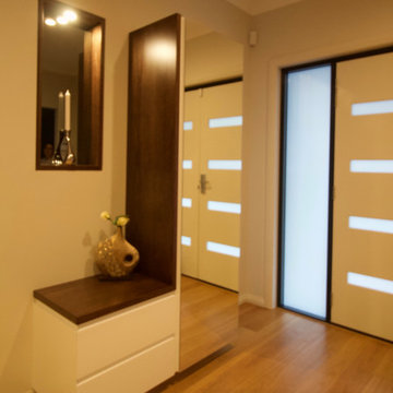 'L' Shaped media unit, and shoe cupboard at entry