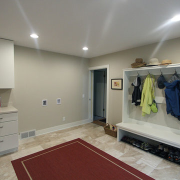 Large Mudroom with Future Laundry Hook Ups and White Cabinets