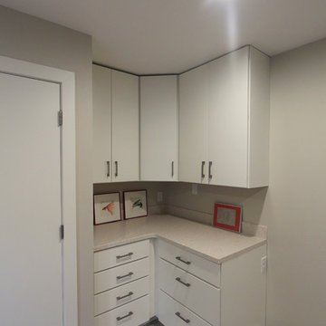 Large Mudroom with Future Laundry Hook Ups and White Cabinets