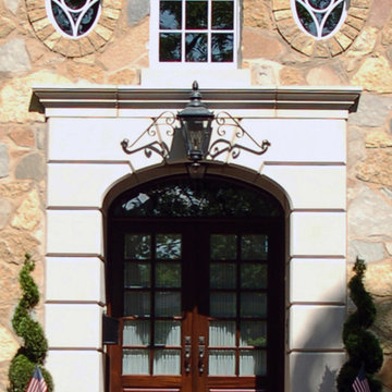 Limestone Entry with Decorative Windows