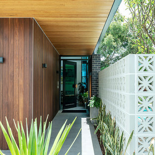 This is an example of a midcentury entryway in Perth.