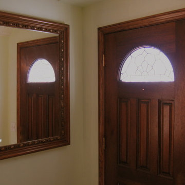 Mahogany door with arched window
