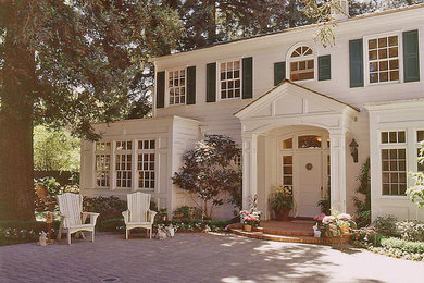 Single front door - mid-sized traditional single front door idea in San Francisco with a white front door