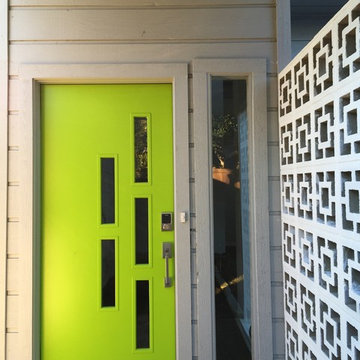 Mid century modern door with asymmetrical glass panel inserts