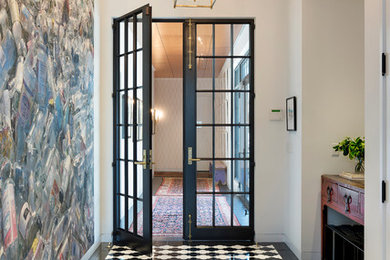 Large transitional ceramic tile entryway photo in Minneapolis with white walls and a glass front door