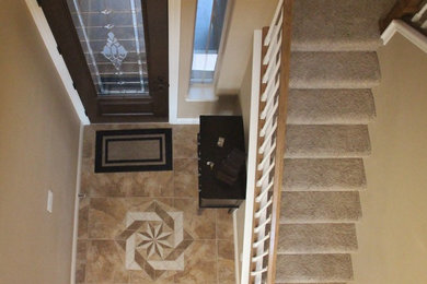 Staircase - mid-sized traditional staircase idea in Denver