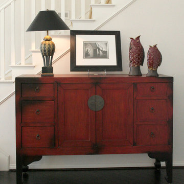 MODERN CHINESE RED CHEST IN HALL