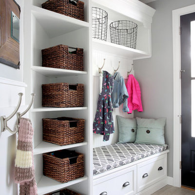 Mudroom - small traditional mudroom idea in Chicago with gray walls