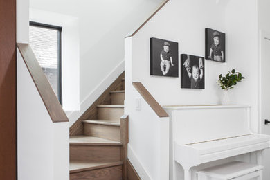 Example of a large minimalist staircase design in Toronto