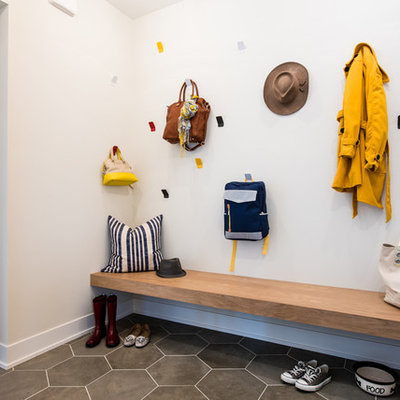 Inspiration for a transitional ceramic tile and gray floor mudroom remodel in Minneapolis with white walls