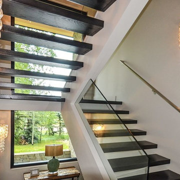 Modern  Floating Staircase with black steps Glass Railing