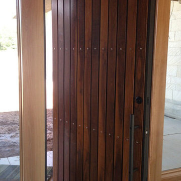 Modern Pivot Iron and Wood Door