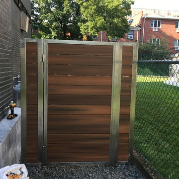 Modern stainless steel gate with fiberon composit wood.composit deck