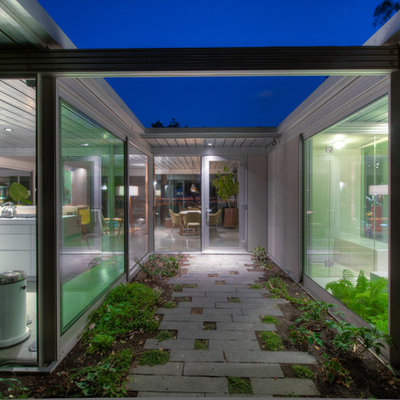Trendy entryway photo in San Francisco with a glass front door