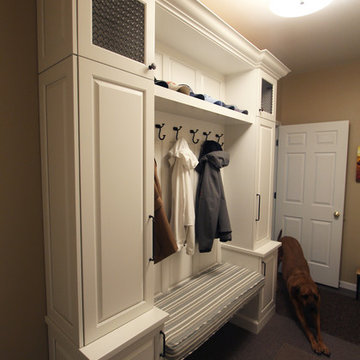Mudroom Built-Ins in White Cabinets with Wire Mesh Inserts